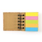 Open notebook with spiral binding and colorful sticky notes inside on a white background.