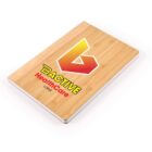 Wooden surface clipboard with Bactive Healthcare and a red-orange logo.
