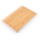 A rectangular wooden cutting board with a white border on a white background.