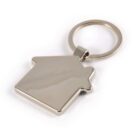 Silver house-shaped keychain against a white background.