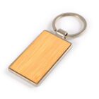 Rectangular bamboo keychain with a silver metal frame and ring.