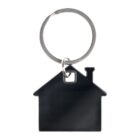 House-shaped metal keychain with chimney, attached to a round keyring, on a white background.