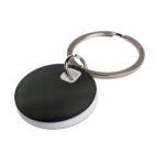 Round black keychain tag attached to a metal ring, isolated on a white background.