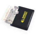 Metal multi-tool card partially in a black pouch with Direct Delivery text in yellow.