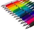 A row of colorful pens lined up in order, with tips facing forward on a white background.