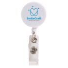 White badge reel with SmileCraft Dental Clinic Centre logo and a heart design above a clip.