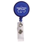 Blue Happy Paws Vet Clinic badge reel with paw prints and a belt clip.