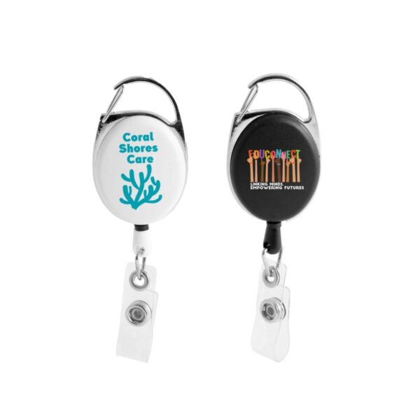 Two retractable badge holders with clips, one white with Coral Shores Care, one black with Educonnect.