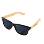 Black sunglasses with wooden arms featuring a logo on the side.