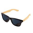 Black sunglasses with wooden arms on a white background.