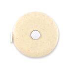 A round beige tape measure with a speckled pattern, white button, and a pull-out tab.