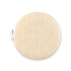 A round, beige compact made of speckled eco-friendly material with a small hinge.