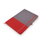 A closed notebook with a red and gray textured cover, red elastic band, and ribbon bookmark.