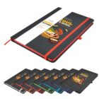 A black notebook with a colorful cover design featuring food graphics and the text Seoul in a Bowl. It has a red elastic band and bookmark. Multiple color variations of the notebook are displayed below in a fan arrangement.