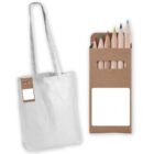 A white tote bag with long handles and a brown cardboard tag featuring six natural wooden pencils in various colors attached to it. A separate set of six colored pencils in a similar cardboard holder is placed beside the bag.