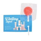 Red lollipop attached to a card with a fantasy castle design. The card displays Fantasy Land and contact details, including a phone number, email, and website. The lollipop is wrapped in clear plastic.