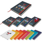 A display of colorful notebooks with a dark cover design showcasing various featured images and text. Notebooks are arranged in a gradient of colors including red, blue, green, orange, white, and more, with a distinct cover layout on each.
