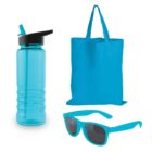 Blue drinking bottle with straw, blue tote bag, and blue sunglasses with dark lenses are arranged against a plain white background.