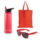 A red water bottle with a flip-top lid, a red tote bag, and a pair of red sunglasses with black lenses are displayed against a white background.