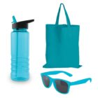 A translucent blue water bottle with a black flip-top lid, a matching blue reusable tote bag, and a pair of blue sunglasses with dark lenses are arranged against a white background.