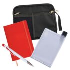 A black zippered pouch, a red notebook, a white pen with red accents, and a clear flat water bottle with a black cap are displayed against a white background.