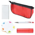 A red zippered pencil case, a pen with a red clip, a red highlighter, a closed white notebook, and a set of flower-shaped sticky notes with colored tabs are arranged on a white background.