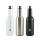 Three insulated bottles in white, silver, and black are standing side by side. Each bottle has a sleek, cylindrical design and the logo MobiCurrency printed vertically on the front. They have metallic caps and a minimalist style.