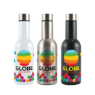 Three colorful bottles stand side by side. Each has a metallic cap and a logo featuring a rainbow globe above the text GLOBE COLOURS. The bottles are decorated with vibrant, multicolored circles.