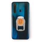 A smartphone with a blue and black gradient back, featuring a camera module and fingerprint sensor. A bottle opener phone stand with the text Bernards Leatherworks is attached to the back.