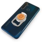 A dark blue smartphone with a silver and wooden phone grip and stand attached to the back, featuring a logo with the letter B and the text Bernards. The phone has a fingerprint sensor and a camera array.