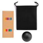 A cardboard box with colored pencils, a black drawstring pouch, and a black spherical object are arranged on a white background.