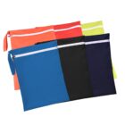 A collection of colorful zippered pouches is displayed in a fan arrangement. The pouches are red, blue, black, navy blue, and yellow, each featuring a white zipper with a small looped handle.