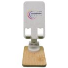 A white adjustable phone holder with a wooden base. The holder is branded with SocialPulse Media in multicolored text and features a circular logo of small dots forming a gradient from blue to pink to orange.