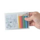 A hand holding a transparent plastic case containing six colored pencils and a small coloring sheet with a drawing of a cat in a hat, flowers, and a landscape. The visible colors of the pencils are brown, red, orange, yellow, green, and blue.