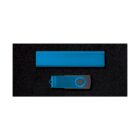 A blue rectangular object and a blue USB flash drive with a black swivel cover are placed on a black surface.