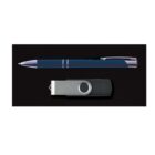 A blue pen with silver accents and a gray USB flash drive are placed against a black background. The pen is positioned above the USB drive, which has a swivel cover design.