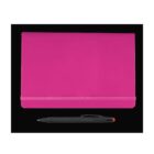 A closed pink notebook with an elastic band and a black pen with a red button, placed on a black background.
