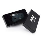 A black box partially open, revealing a coiled black charging cable inside. The box lid, placed beside it, has PRO Electrical printed in white. The cable and box are displayed on a white background.