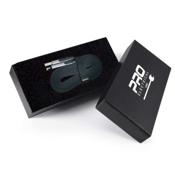 Black gift box with Pro Electrical Power written on the lid, partially open to reveal a neatly coiled dark braided USB cable inside. The interior is lined with black fabric.