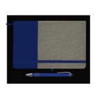 A notebook with a dark blue and gray fabric cover is placed on a black background. It has a pen loop and an elastic closure. A matching blue pen with silver accents lies horizontally beneath it.