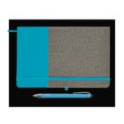A closed notebook with a gray fabric cover and teal spine is paired with a matching teal pen. The notebook has an elastic band and a ribbon bookmark, lying against a black background.