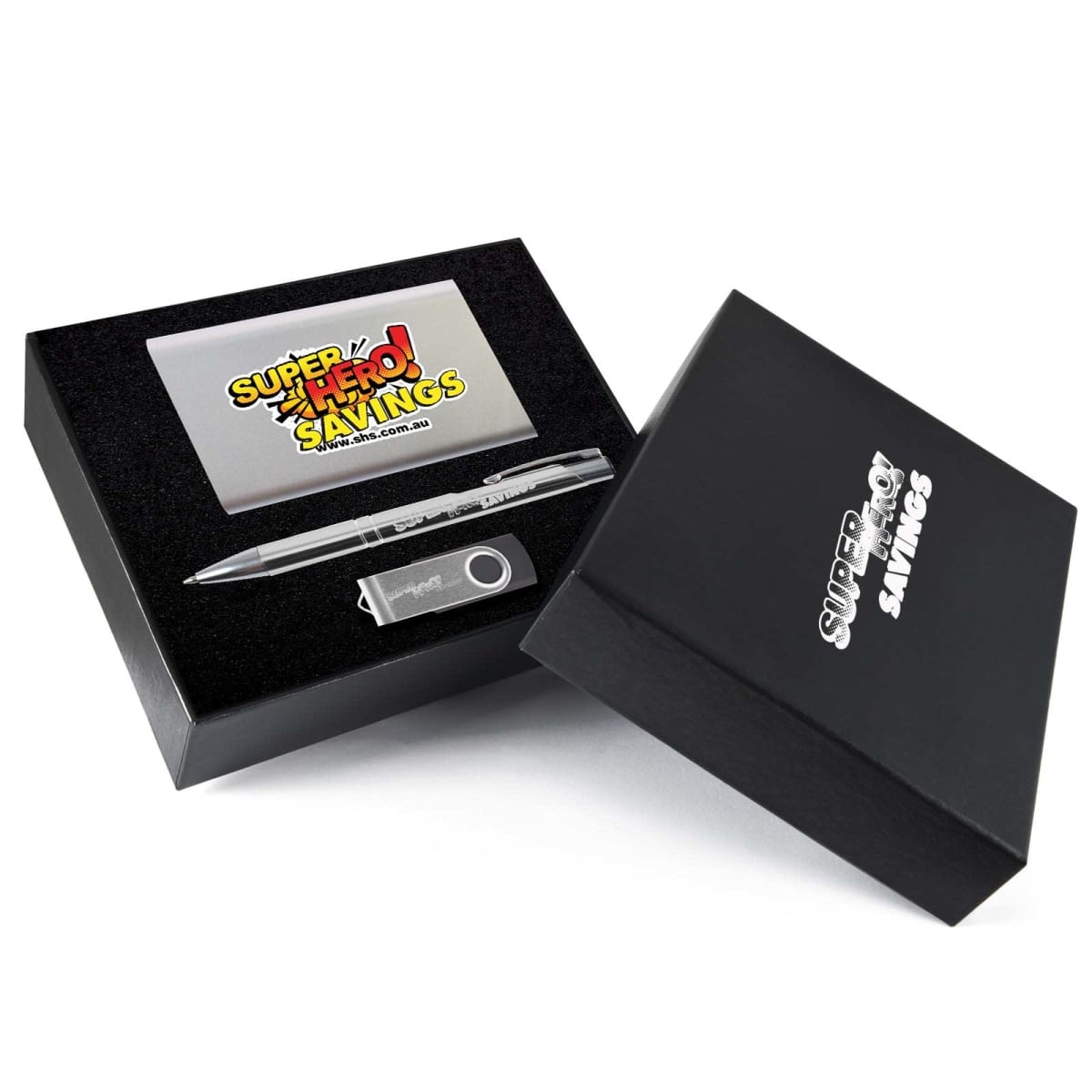 A black gift box with a card labeled Super Hero Savings, a transparent ballpoint pen, and a silver USB drive. The box lid is partially removed, displaying the contents on a white background.