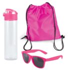 A pink-themed set including a clear water bottle with a pink lid, a pink drawstring bag, and pink sunglasses with dark lenses.