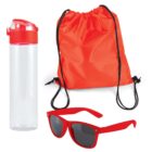 A set of red accessories including a transparent water bottle with a red lid, a red drawstring backpack, and red sunglasses with dark lenses. The items are arranged on a white background.