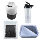 A collection of four items: a rolled-up dry bag, a transparent shaker bottle with a black lid, a mesh fabric in a sealed plastic bag, and a divided plastic container with a fork inside.
