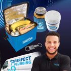 A blue lunch bag containing a sandwich, banana, and drinks is shown. Next to it are a branded mug and keychain. A man smiling stands in front of a van with Perfect Plumbing written on it, set against a blue background.