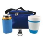 A blue insulated lunch bag with a zipper is placed behind a blue can cooler holding a drink can, a blue and white reusable cup, and a black and white bottle opener.