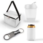 A white insulated lunch bag with a black strap, a white travel mug with a lid, a gray and black bottle opener keychain, and a can in a white sleeve.