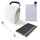 A set of office supplies includes a white insulated lunch bag with a black handle, a clear flat water bottle with a black cap, a silver pen with a clear casing, and a black notebook with a white elastic band closure.