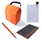 Orange lunch bag with black handle, rectangular transparent water bottle with black cap, orange ballpoint pen with silver accents, and black notebook with orange elastic band and pen loop. Items are arranged on a plain white background.